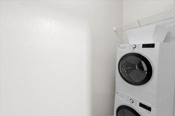 Stackable Washer/Dryer Included with A1 Floor Plans at Creekview Apartment Homes, Dallas, TX, 75254